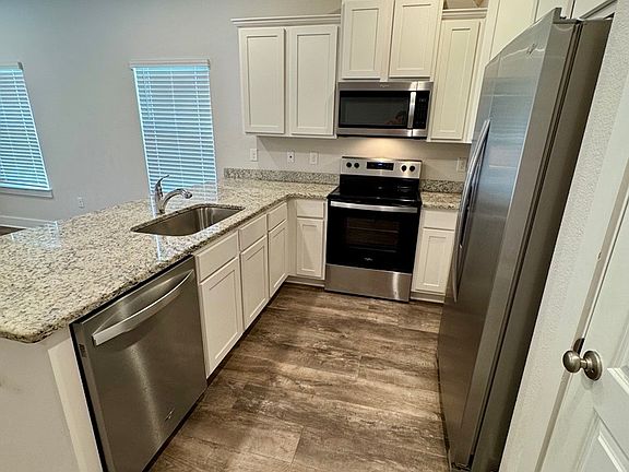 Upgraded kitchen with pantry and breakfast bar