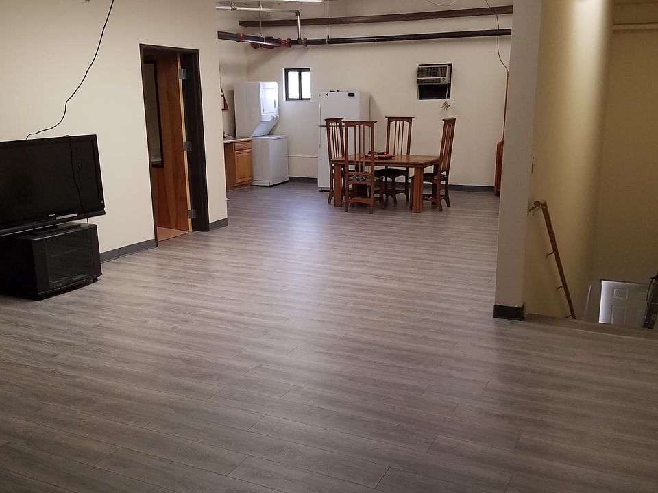 facing dining room and kitchen to the side. bath door on the left.