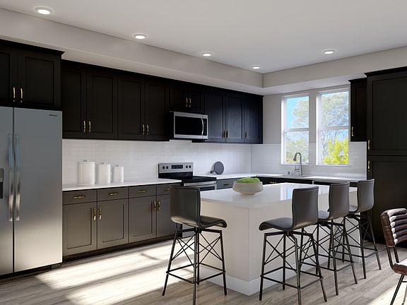 Spacious, island kitchen with eat-in bartop and abundant cabinet space