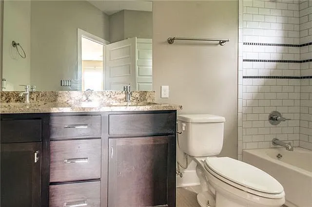 Dual sink vanity in Primary bath as well as a nice linen closet
