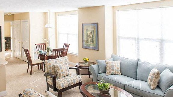 2-bedroom ranch style apartment with great room with kitchen with breakfast bar, living and dining areas, and large, bright windows