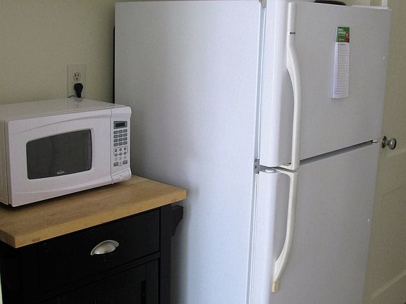 Kitchen fridge, black cabinet
