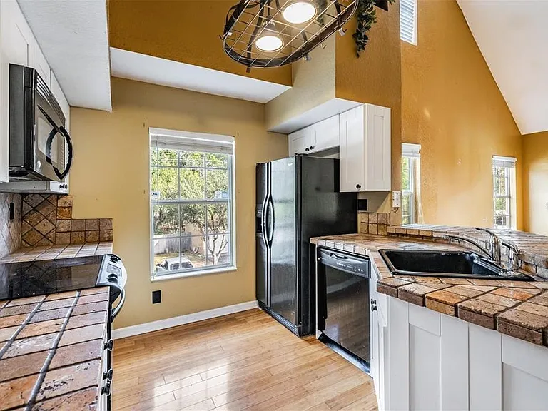 9156 Lake Chase Island Way #9156 — Photo 21