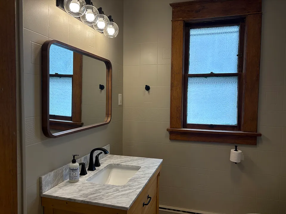Updated bathroom with new vanity.