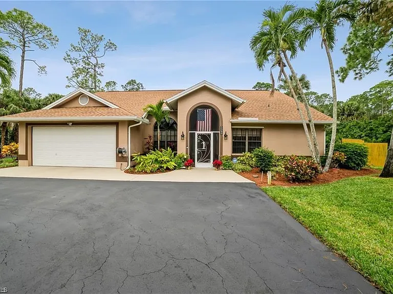 5980 Hidden Oaks Ln — Photo 3