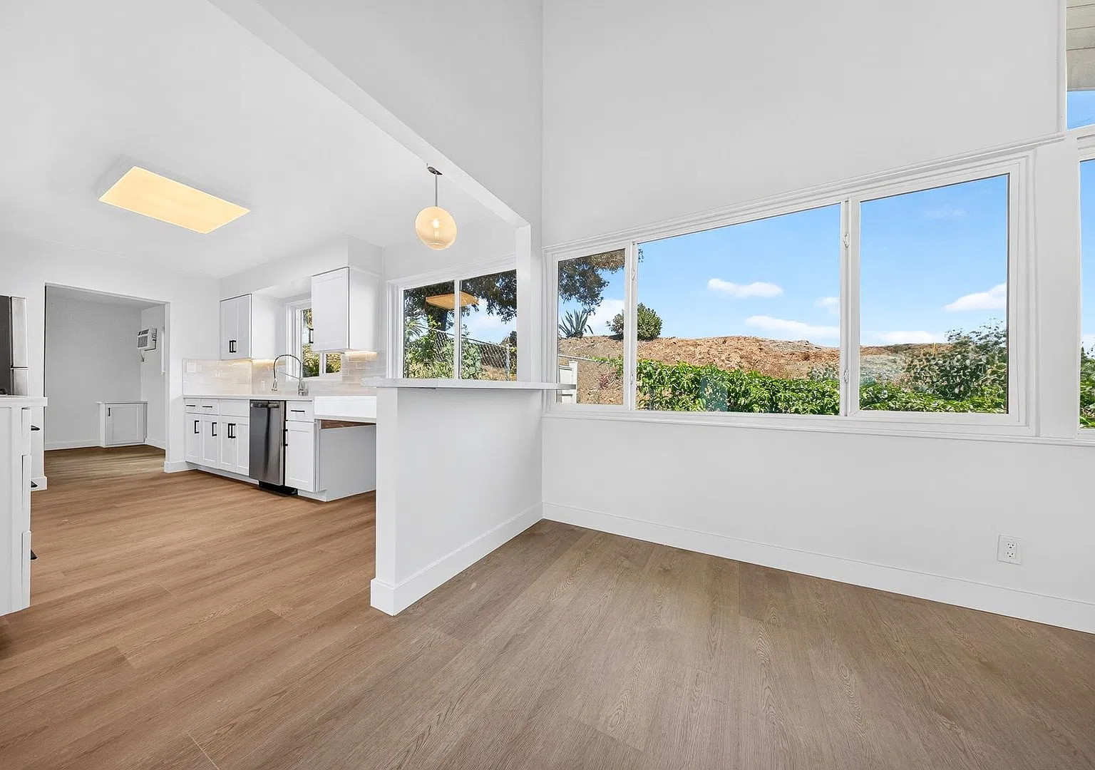 A Masterpiece of Light, Lawn, and Design: Neutra-Inspired Living at 17050 Sunset — Photo 1