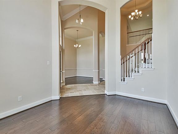 Foyer features an open passage way to flex room could be use as (Study/Formal living)
