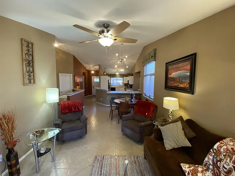 Comfty rockers plus Macy's plush couch and 4 TV's on the property! (Master, Living Room, 3rd bedroom and outdoor patio has a TV!)