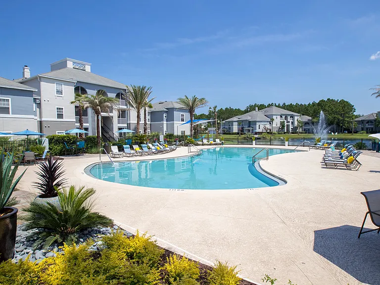 Sprawl out on our expansive sundeck featuring plentiful poolside loungers and tables with umbrellas to find your perfect space to enjoy the atmosphere.