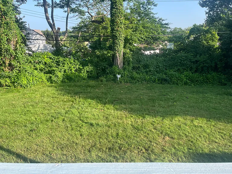 Large backyard and large private deck not pictured