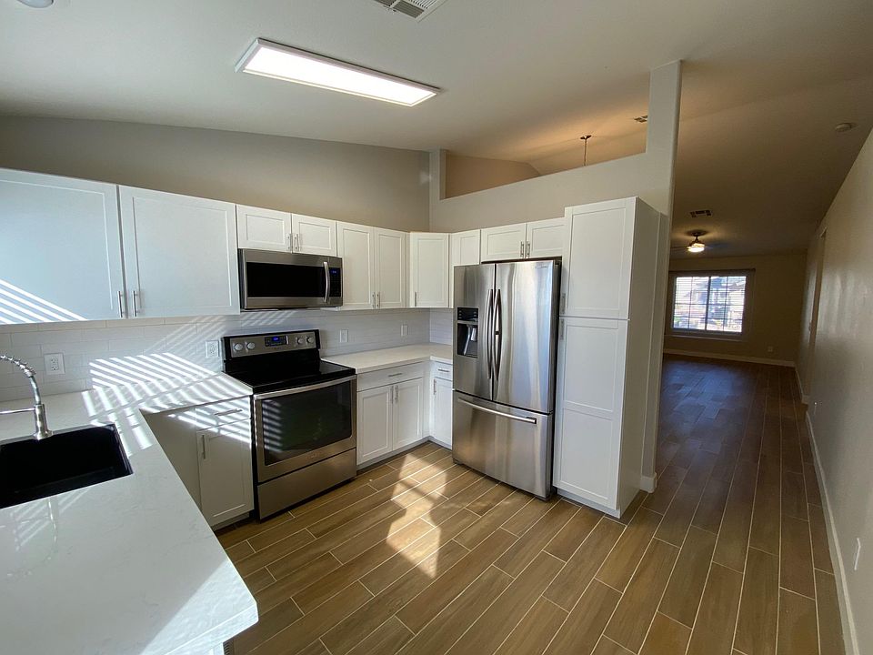 Brand new shaker style cabinets with stainless steel appliances