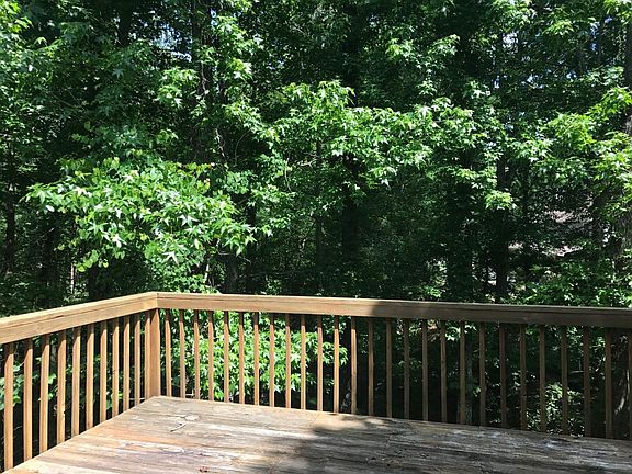 Back deck on private wooded lot