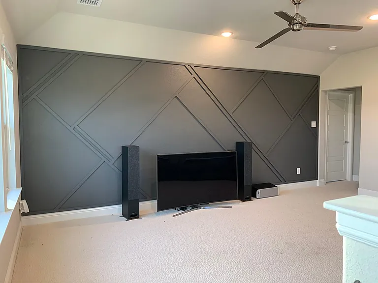 Upstairs Game room with custom modern wainscoting feature wall