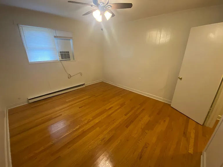 Private carport, in-unit laundry, and the Lakewood strip right outside your door. — Photo 12