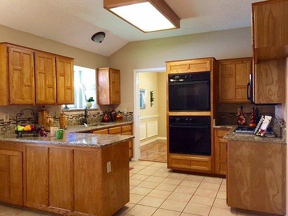 Kitchen has granite countertops and double ovens! Great for