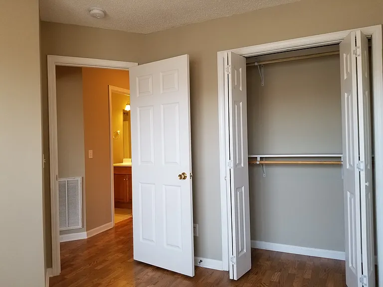 FRONT LEFT BEDROOM WITH DOUBLE HUNG CLOSETS!