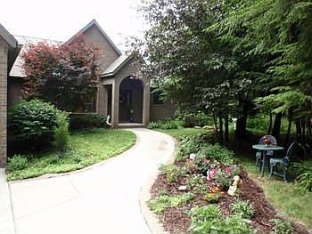 Professional landscaping all around the home...Sprinkler System upgrade to 220 volt pump motor, and Newer distribution valves & Manifold system.