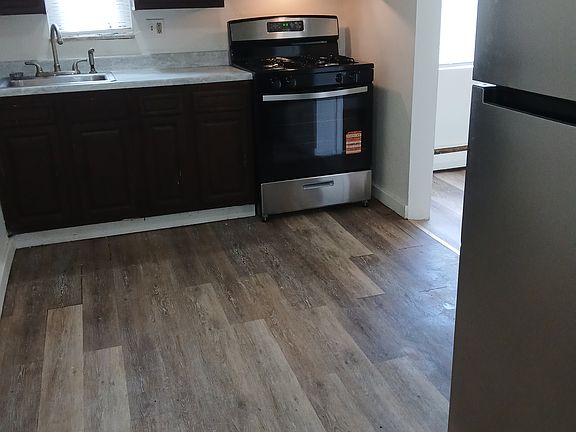 Kitchen with brand new range