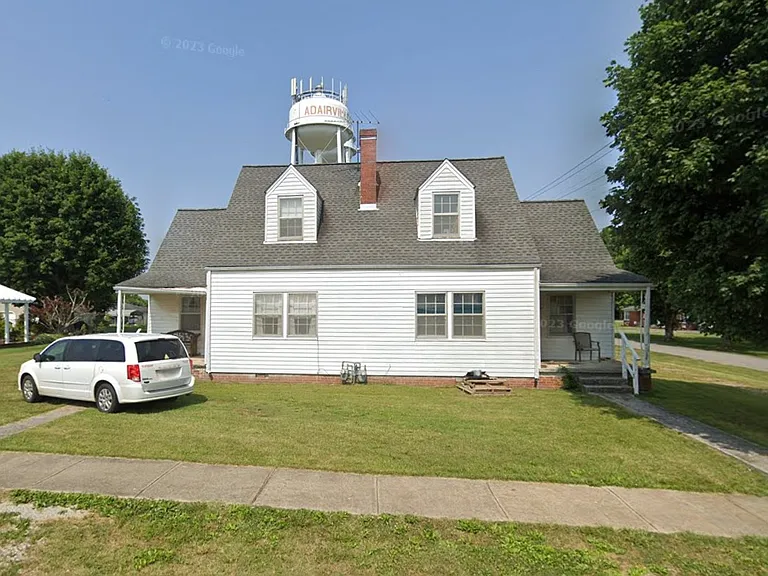 Front Yard with apartment for rent to the right Upstairs rooms not included.