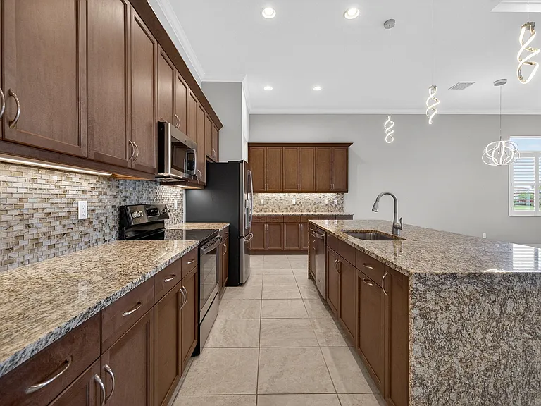 9318 SW Miracoli Way — Photo 19