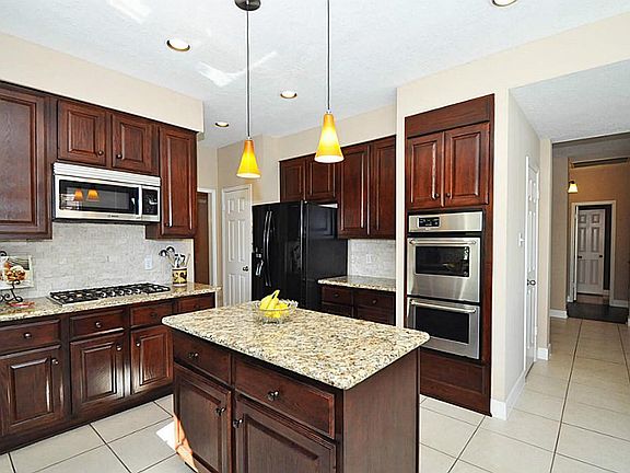 5 burner gas cooktop with overhead microwave and stainless steel DOUBLE ovens