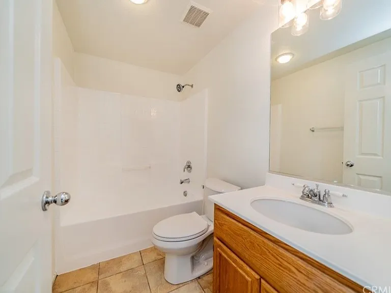 This picture shows the upstairs hall bathroom. There are two full bathrooms upstairs (the master bathroom and the hall bathroom) and a half bathroom downstairs.