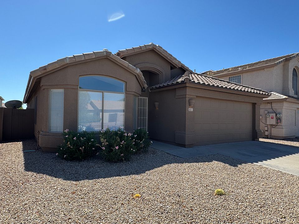 Street View. Low maintenance desert landscaping with drought & heat tolerant plants.
