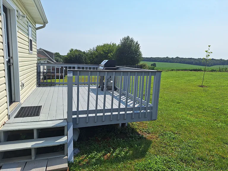 Large back deck to relax on. Grill included!