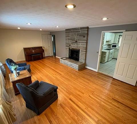 formal living room with fireplace