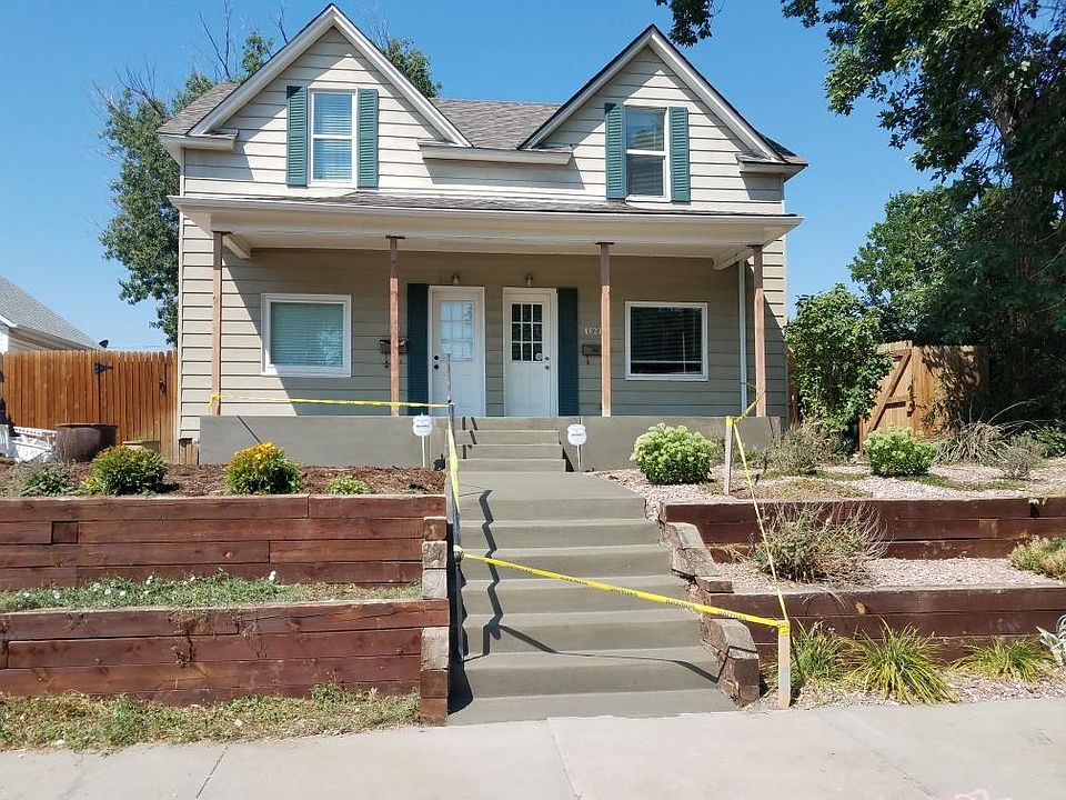 Pardon the caution tape! But a few pics from when the porch was recently repoured, and the walkway was redone.