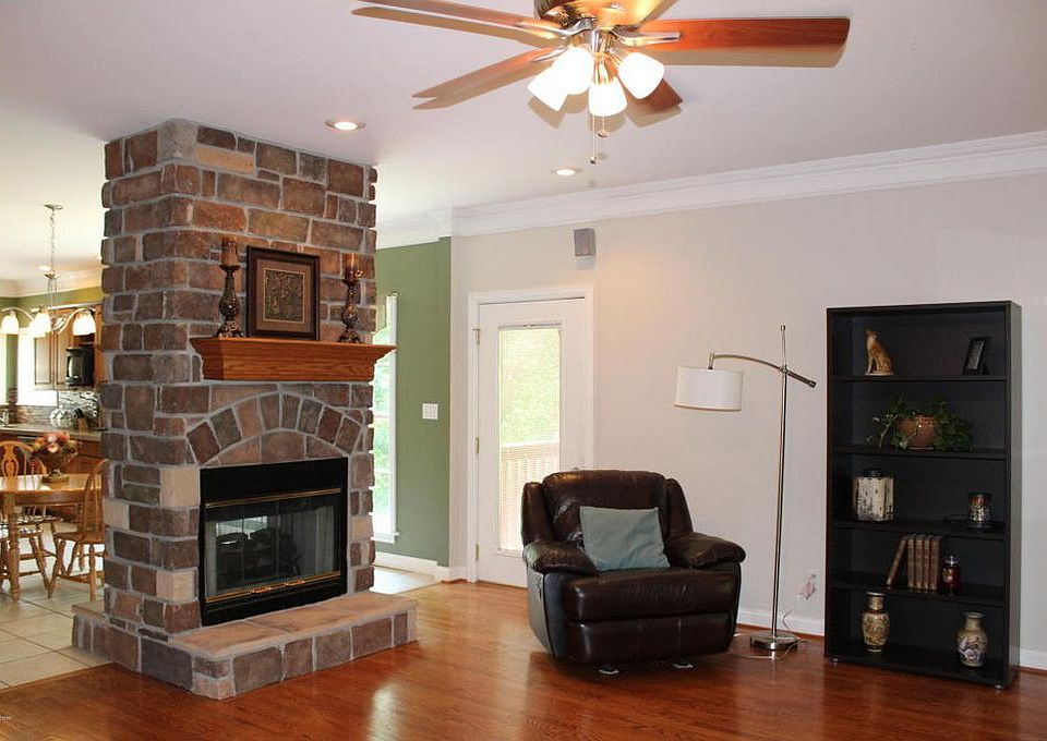 den w/double sided fireplace