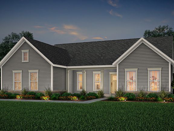 Tangerly Oak Exterior LC3G features siding, covered front porch and 2 car side load garage