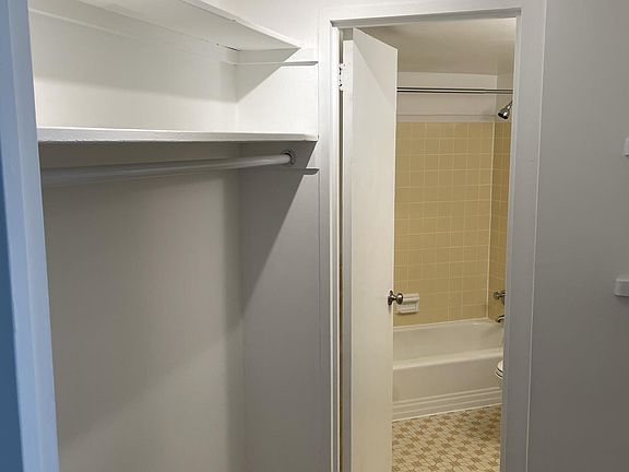Walk-through closet to bathroom. Additional entry closet by front door.