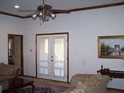 Second view of family room and french doors leading to the covered patio.