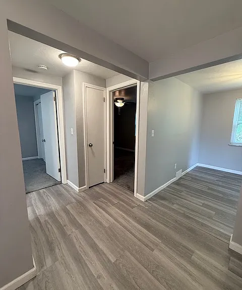 View from kitchen Right to Left:
Dining area, main bedroom, closet/pantry, 2nd bedroom, and bathroom behind leftmost wall in photo.