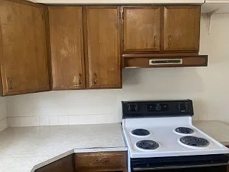 Kitchen stove top and storage cabinets