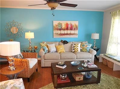 Spacious formal Living Room has beautiful oak floors and lots of light