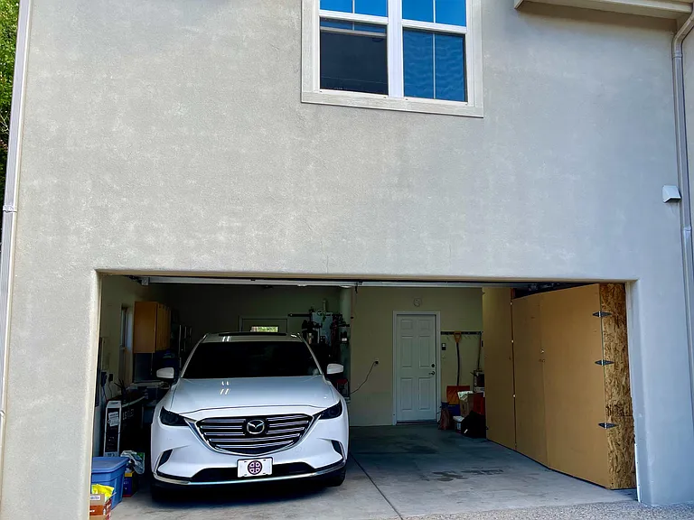 Huge 2-car garage with ample storage