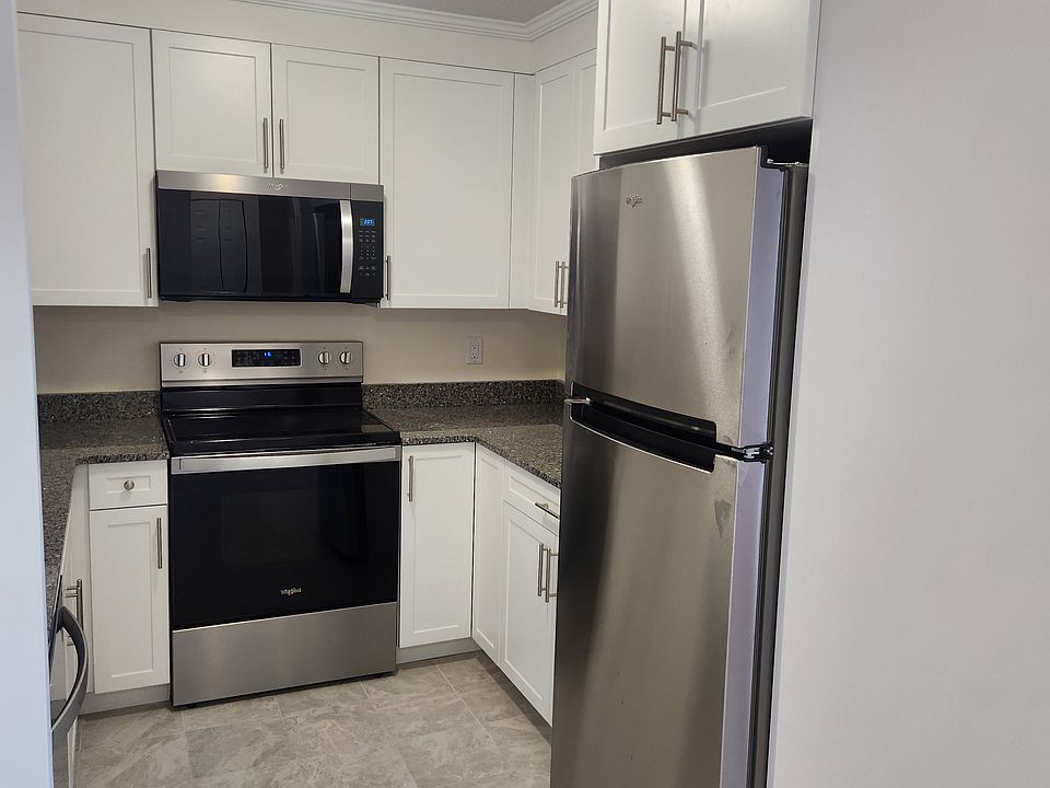 All new cabinets, countertops, appliances and tile flooring.