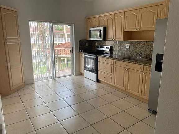 5th image of 6900 NW 179th St #208-3
