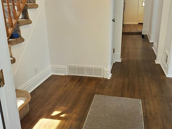 Front Entrance, foyer and view to dining room and Kitchen