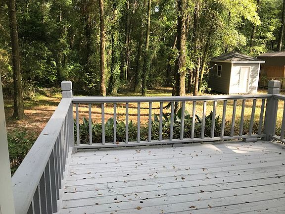 Woods behind with great shed