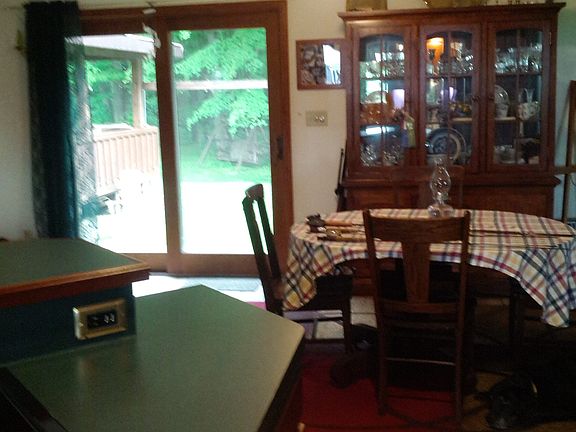 Sliding doors lead to back y