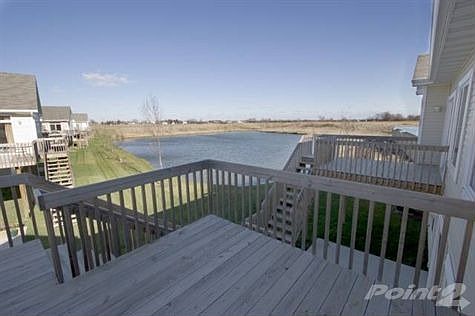Relax on the deck overlooking the lake
