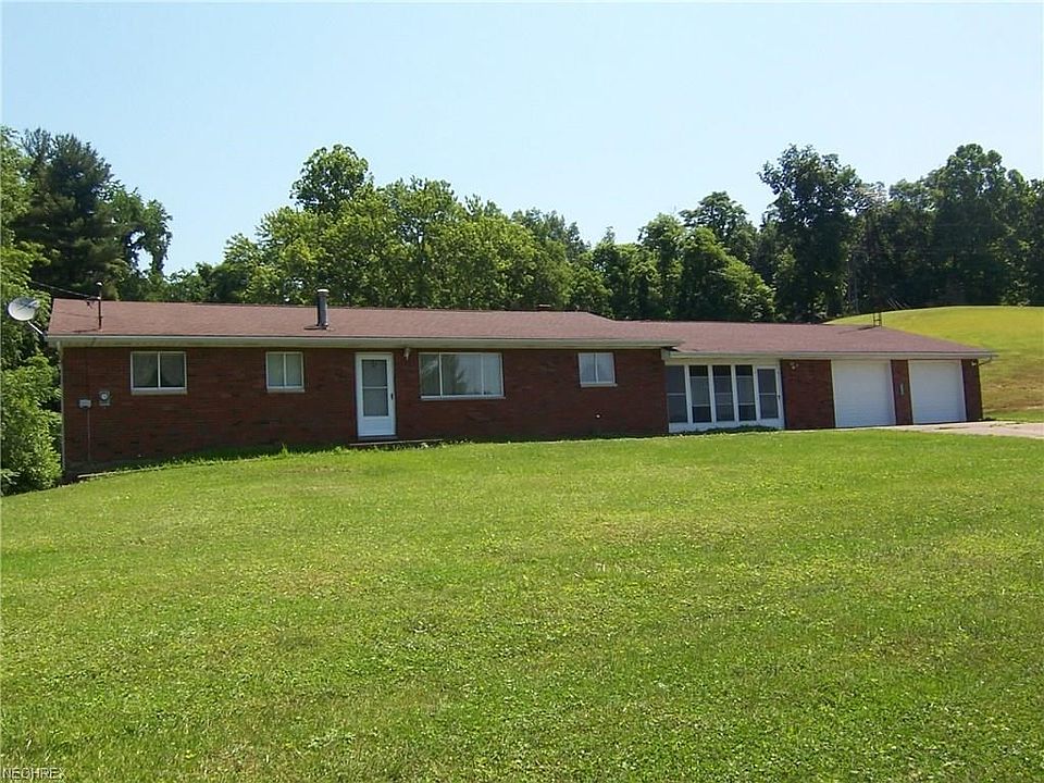 12 acres, FREE GAS, 4 bedroom, 1.5, full basement, screened in breezeway, 2 car garage and 30x54 pole building.
