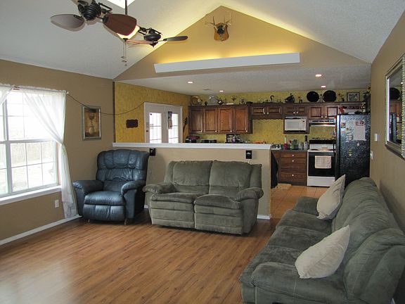 Living room looking into kitchen