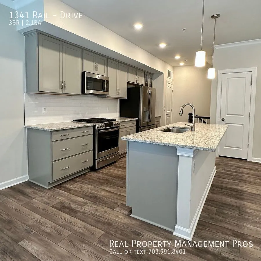Stunning 3-Level Condo with Garage in Desirable Rippon Landing! — Photo 1