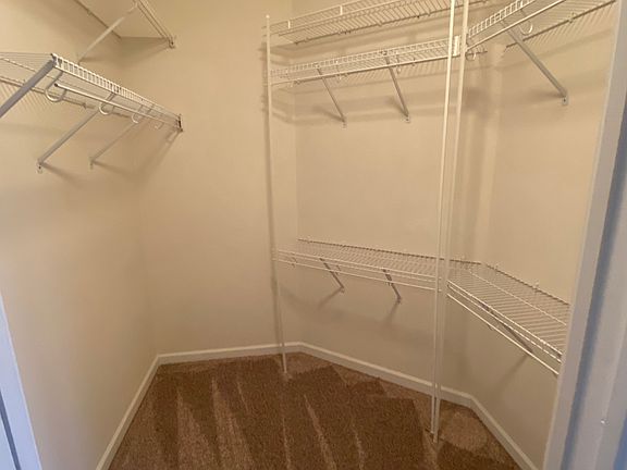 Master bed walk-in closet