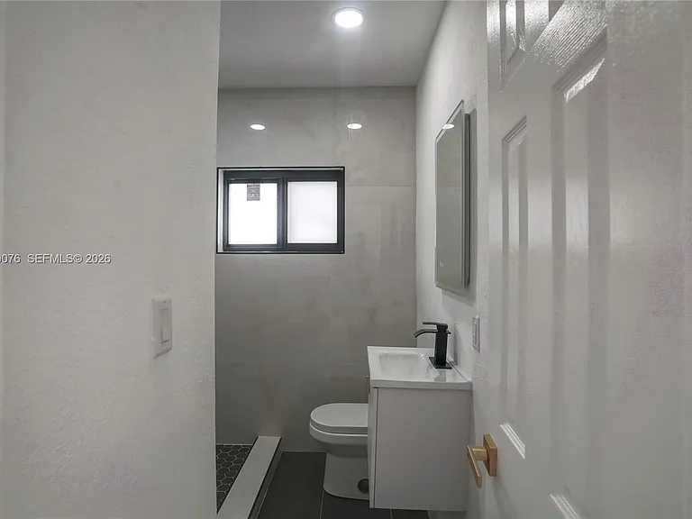315 NW 127th St — Photo 34