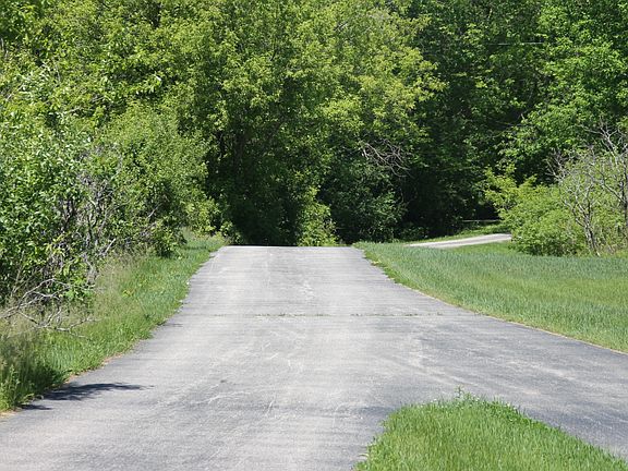 asphalt drive-hidden house